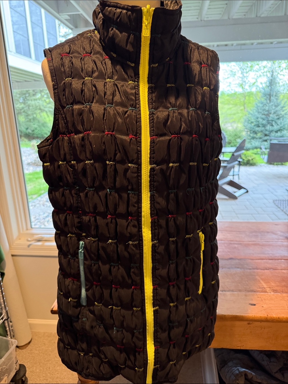 Black Quilted Puffy Vest with Yellow & Blue Zip